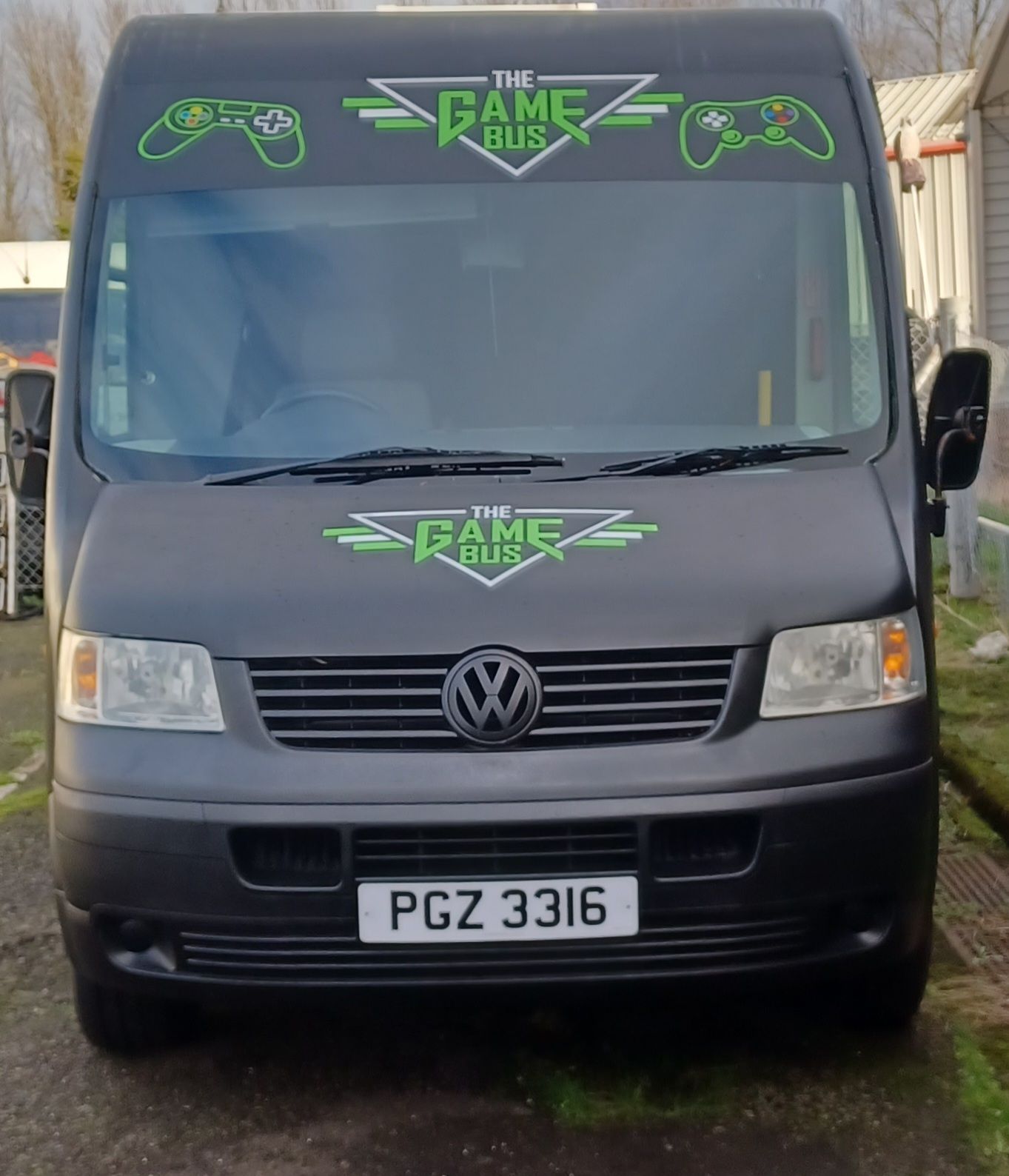 Front of the Game Bus with its green logo